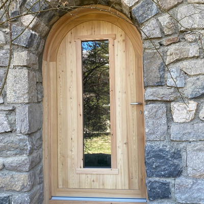porte d'entrée avec vitre et pierres